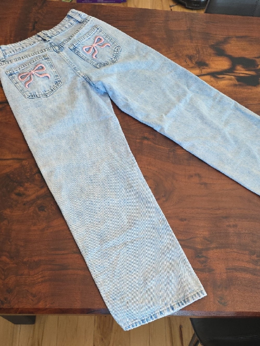 Light Wash Women’s High-Rise Jeans with Pink Bow Embroidery
